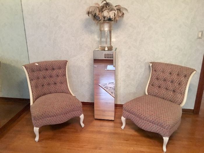 Pair of vintage slipper chairs with peacock motif upholstery 