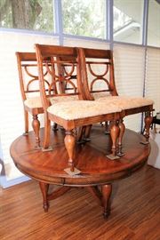 Large Round Table with Five Chairs