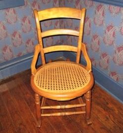 Vintage cane seat rocking chair