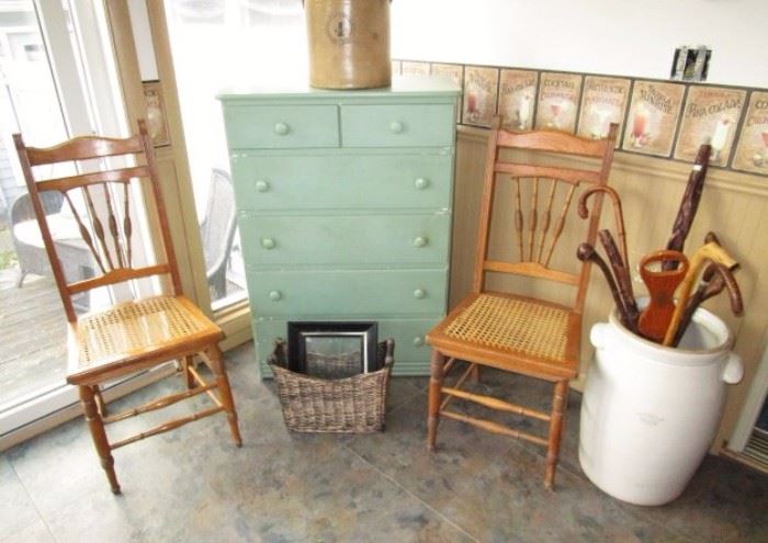 Antique wooden chairs, green painted chest of drawers, 10 gal churn, 4 gal crock, part of cane collection.