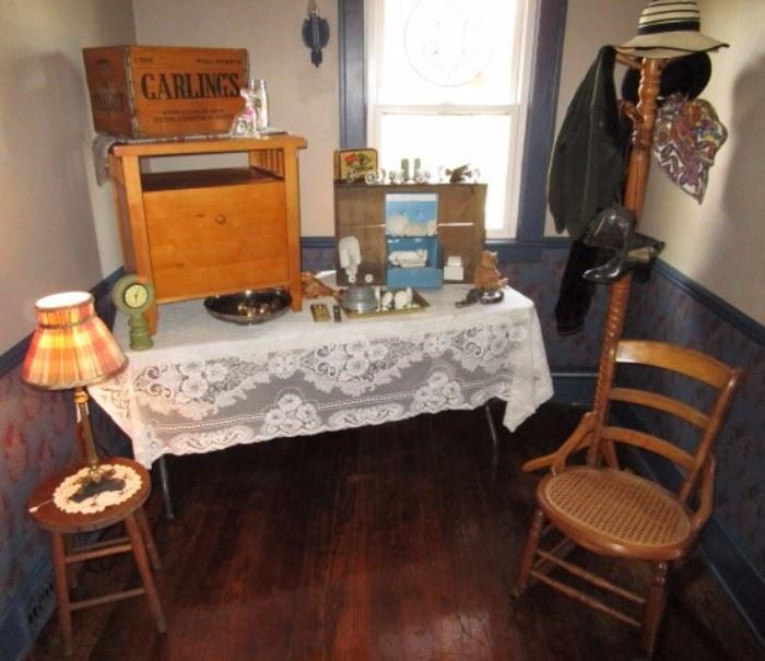 Misc. antiques/collectibles, wooden crates, porcelain fixtures, rocking chair, hat tree.