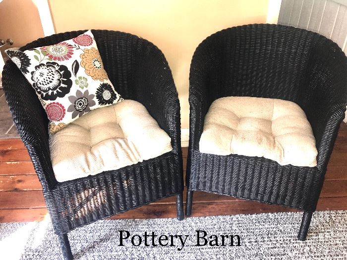 Pair of vintage black wicker chairs by Pottery Barn. Located in the house