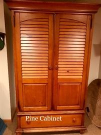 Pine storage cabinet. Located in house