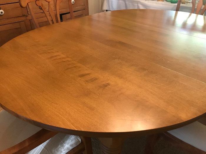 Nichols and Stone Dining Room Table with Five Chairs. Table shown with one leaf which when removed converts the table to a perfect circle.