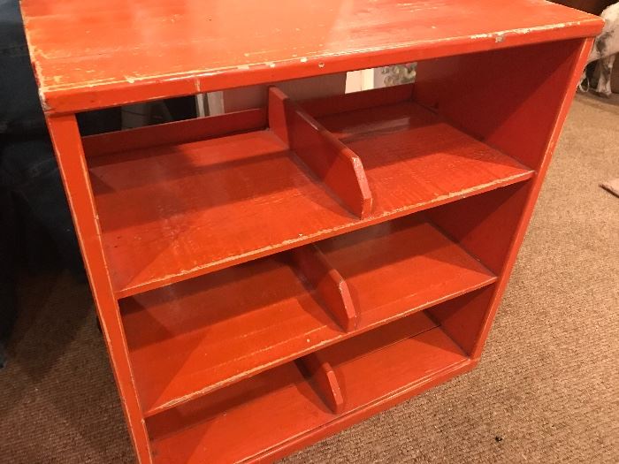 Painted orange vintage shelf with shelf dividers