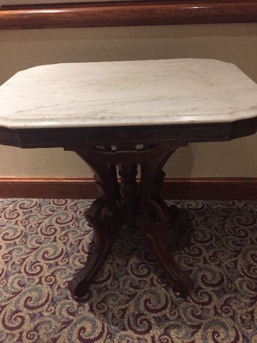 Beautiful mahogany side table with marble top.