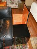 View showing how tables open for storage.