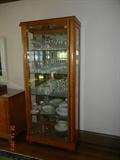 China or curio cabinet with four adjustable shelves. 31 1/2"w x 16 1/2"d x 77"h. $480.00 Many of the items in the cabinet will also be in the sale.