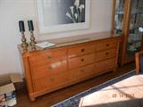 Fabulous buffet or even use as a dresser. Glass top to protect the surface and 9 useful drawers. 74"l x 19"d x 32 1/2"h. $800
