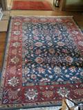 Approximately 7 x 9 area rug $80.00