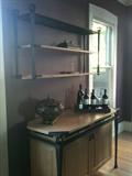 Hang it on the wall as shown or use it on the floor, this is a terrific piece or displaying art, housing glassware or books. 53 1/2"w x 29 1/2"h x 12"d. Sideboard is not for sale.