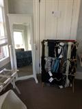 Lots of scarves but mirror is for trying on clothing, not for sale