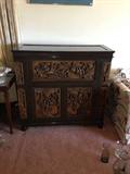 Carved vintage bar from Asia following pictures show the various storage and serving spots.