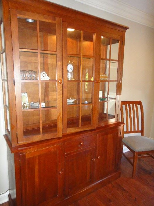 Ethan Allen Cherry china cabinet, matching table and chairs. 