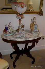 Eastlake Era Marble top End Table with one of the many electrified Oil lamps in this Home