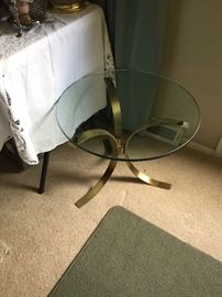 2 matching glass top end tables