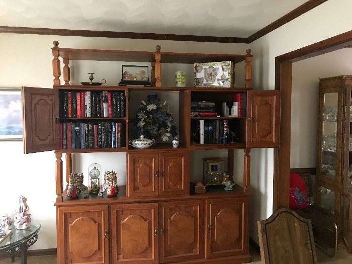 Beautiful wall unit! It's hardwood and comes in 4 pieces. A steal at only $200. Come get it today.