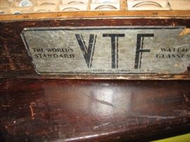 Name on one of the boxes of watch crystals