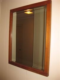 Maple beveled wall mirror.