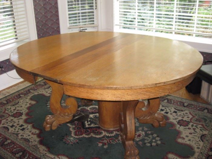 Oak claw-foot dining table