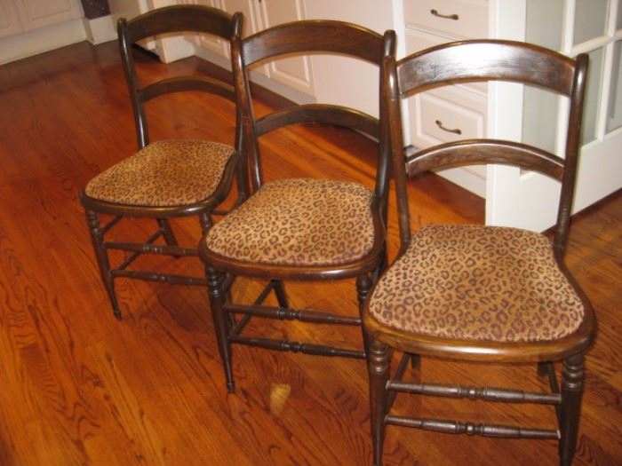 Leopard print side chairs