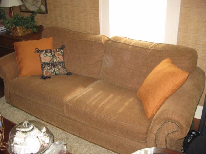 Two-cushion sofa, nail-head trim