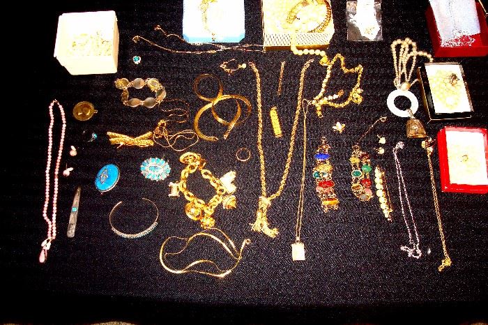 Some of the jewelry which includes 18 kt & 14 kt. items. Will have individual photos & descriptions later.