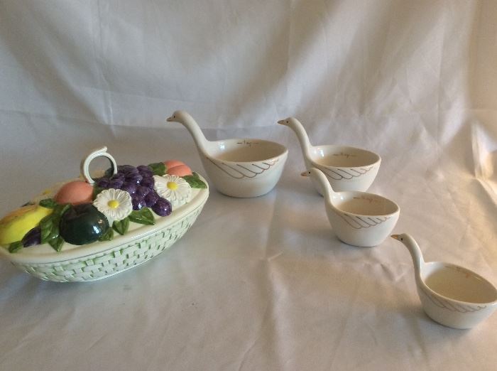 Lidded Serving Dish and Nesting Porcelain Swan Measuring Cups.