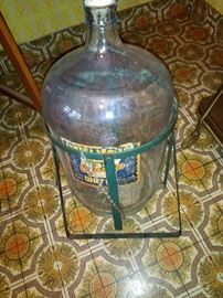 Antique eureka Ozark water bottle and stand