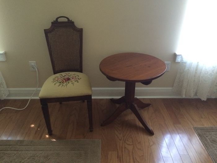 Cane back chair w/needle point seat and small round table