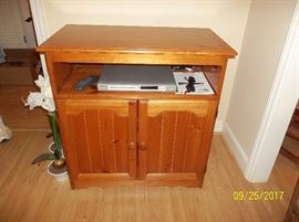 television stand, Phillips DVD player, Panasonic VHR in cabinet