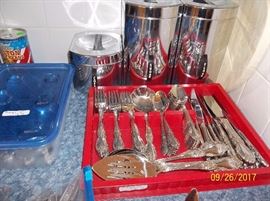 red container and flatware sold, cannisters and other flatware still available