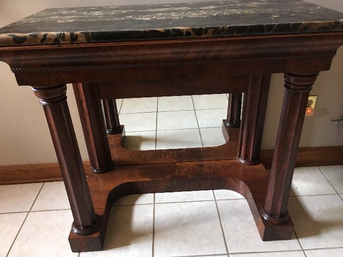 Petticoat table with marble top. 