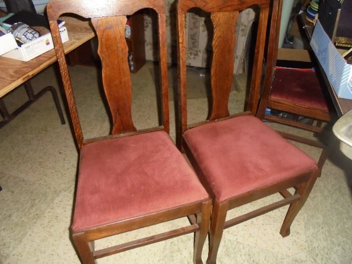 2 of 6 matching oak dining table chairs