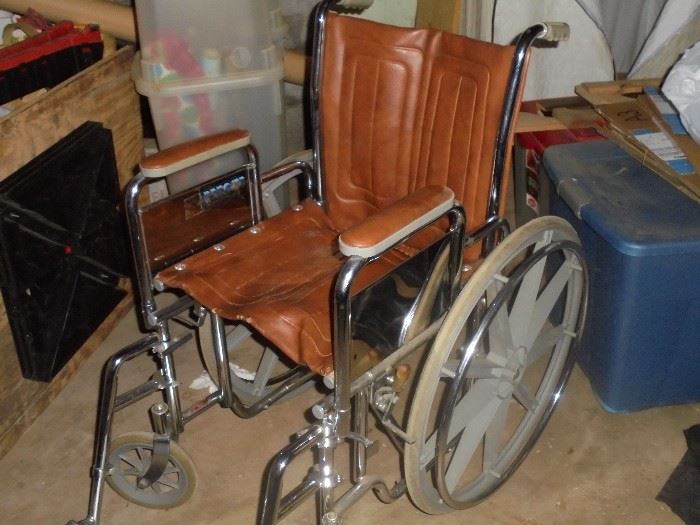 Brown leather wheel chair