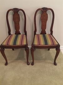 Great pair of antique chairs ..... you can always find a place for extra chairs!