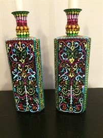 Hand-painted bottles..... used as candle holders!