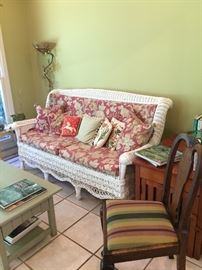 Wicker sofa is the focal point of the sunroom!