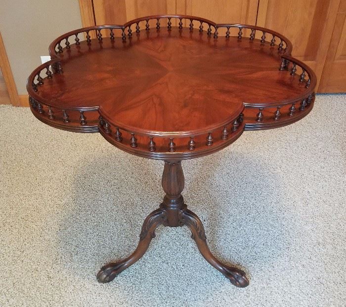 tilt-top table with gallery