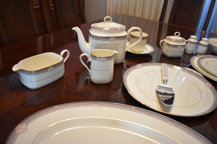 Noritake Sheer Ivory Bone China Service for 12 Stanford Court Pattern ( 113pcs ) *** Plus *** Gorgeous Dining Suite in Immaculate Condition Features a " Knockout" Dining Table that seats 12 with 12 Matching Chairs with Leaves and Pads, a Beautiful China Cabinet that is absolutely  made for Great Display and Storage, Lovely Mirror Backed Server for Silverware and Other Special Dining Accessories, plus a matching "Romantic" (Throw Back to the 1920's) Glass Door Stemware Cabinet This One of a Kind Dining Room Set Suggests pure Dining Elegance from the moment you see it! A real prize for any Dining Experience!
