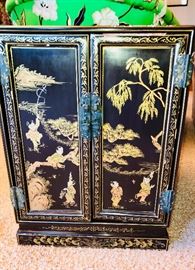Asian inspired decorative two door cabinet 