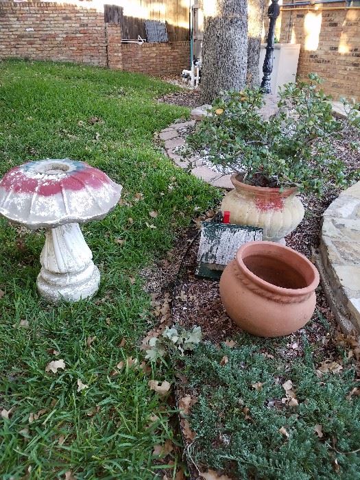Birdbath  and pots for plants 