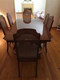 #9 wood dining table w 1 leaf, 6 chairs 82x42x30 $175.00