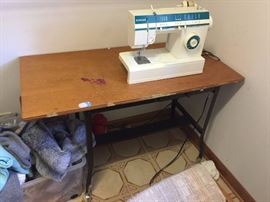 #32 Singer 5817C sewing machine $25.00 
#33 rolling sewing table 40x20.5x27 $35.00