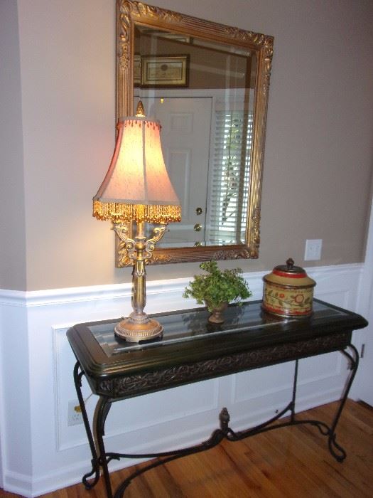 Beautiful Glass top entry/hall table with ornate design, Gold trimmed beveled edge mirror.
