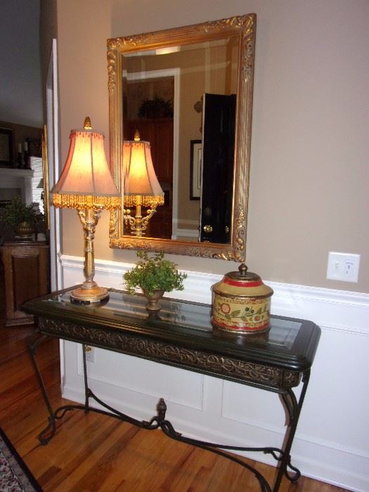 Beautiful Glass top entry/hall table with ornate design, Gold trimmed beveled edge mirror.