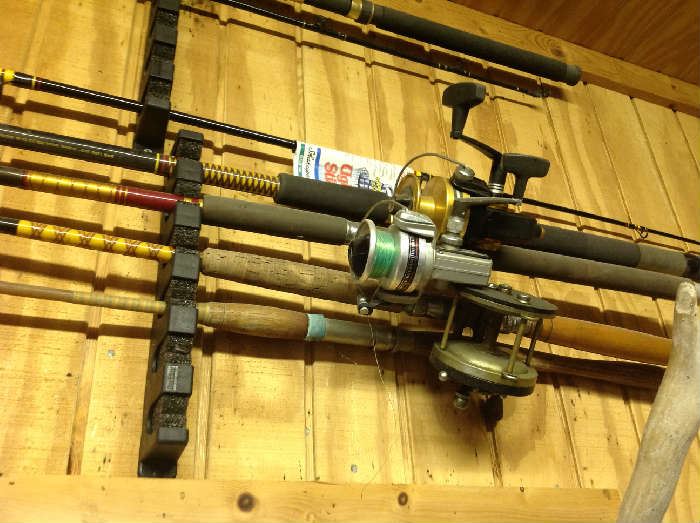 Lots of fishing poles / reels and accessories