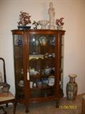 Bow fronted china cabinet.