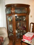 Beautiful Bow Front China Cabinet with claw feet.