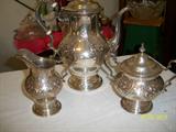 Gorham Sterling " Victorian Chased " Coffee Pot, covered sugar and creamer.